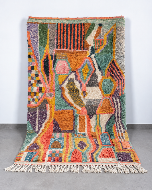 Tapis berbère Beni Ouarain coloré 260 × 160 cm rose, mauve et ocre, laine nouée main au Maroc